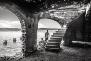 Cuba, Havanna, two young men in old building by the sea, Cuba, Havanna, two young men in old building by the sea,